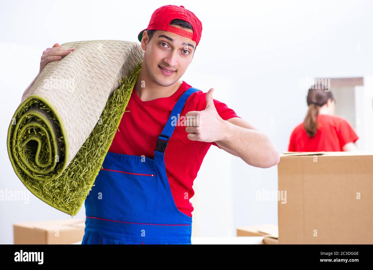 Professional movers doing home relocation Stock Photo