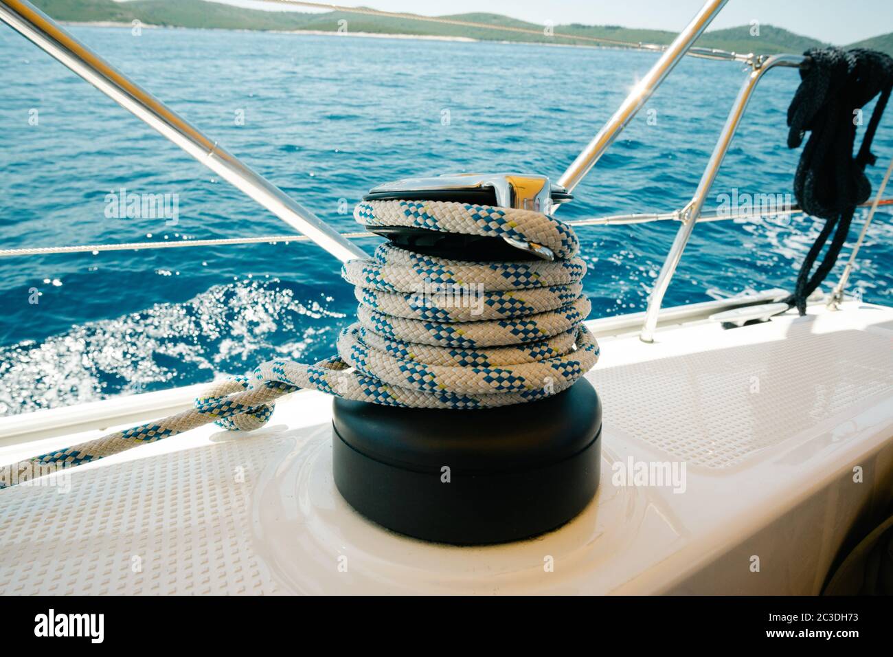 Wrapped sailing rope on a yacht. Sail and yachting concept Stock