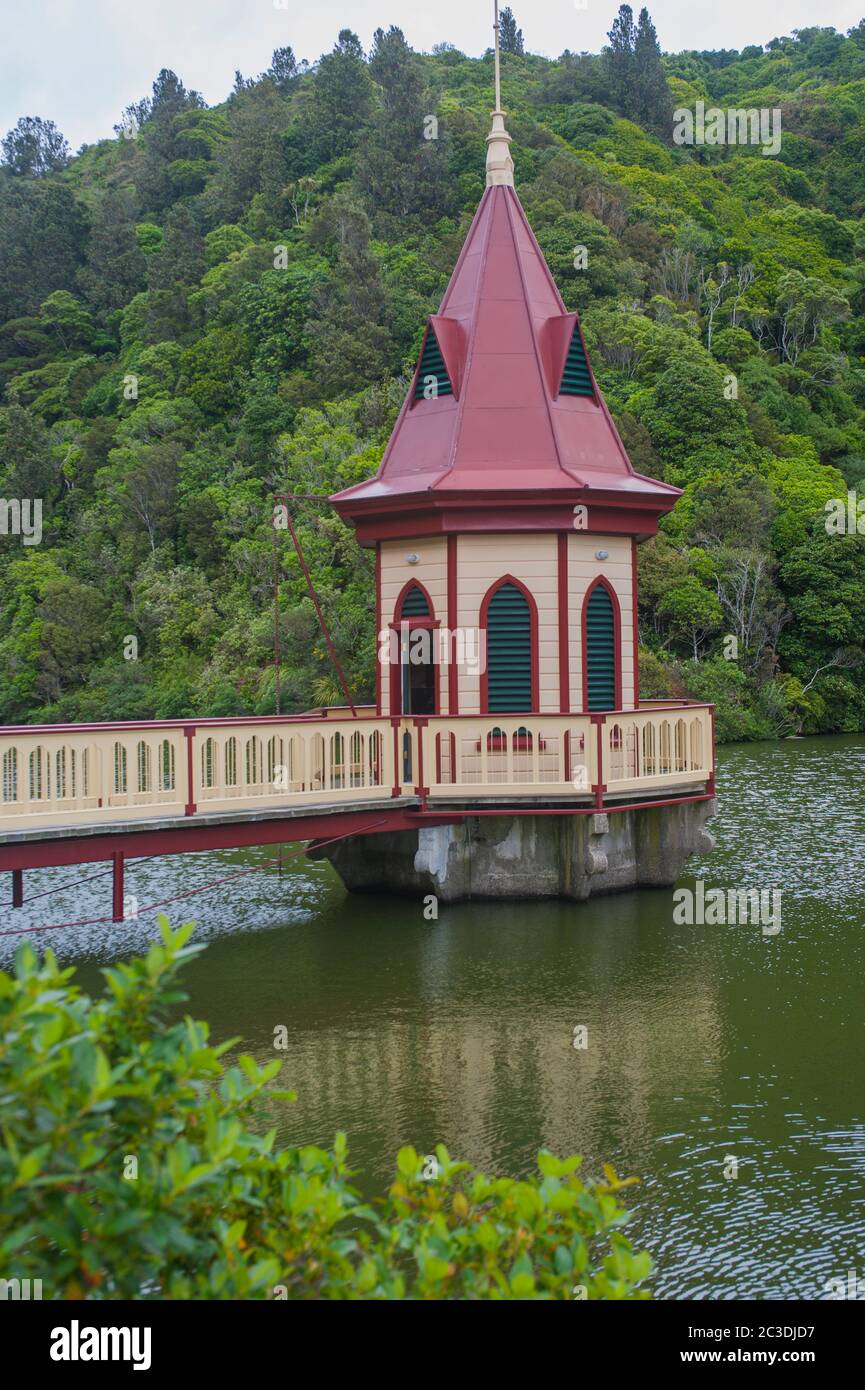 View of Zealandia, formerly known as the Karori Wildlife Sanctuary, with the lake and the valve tower near Wellington on the southern tip of the North Stock Photo