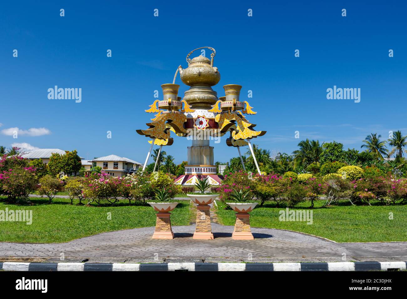 Sculpture of a giant tea kettle at a roundabout in Kuala Belait, Brunei