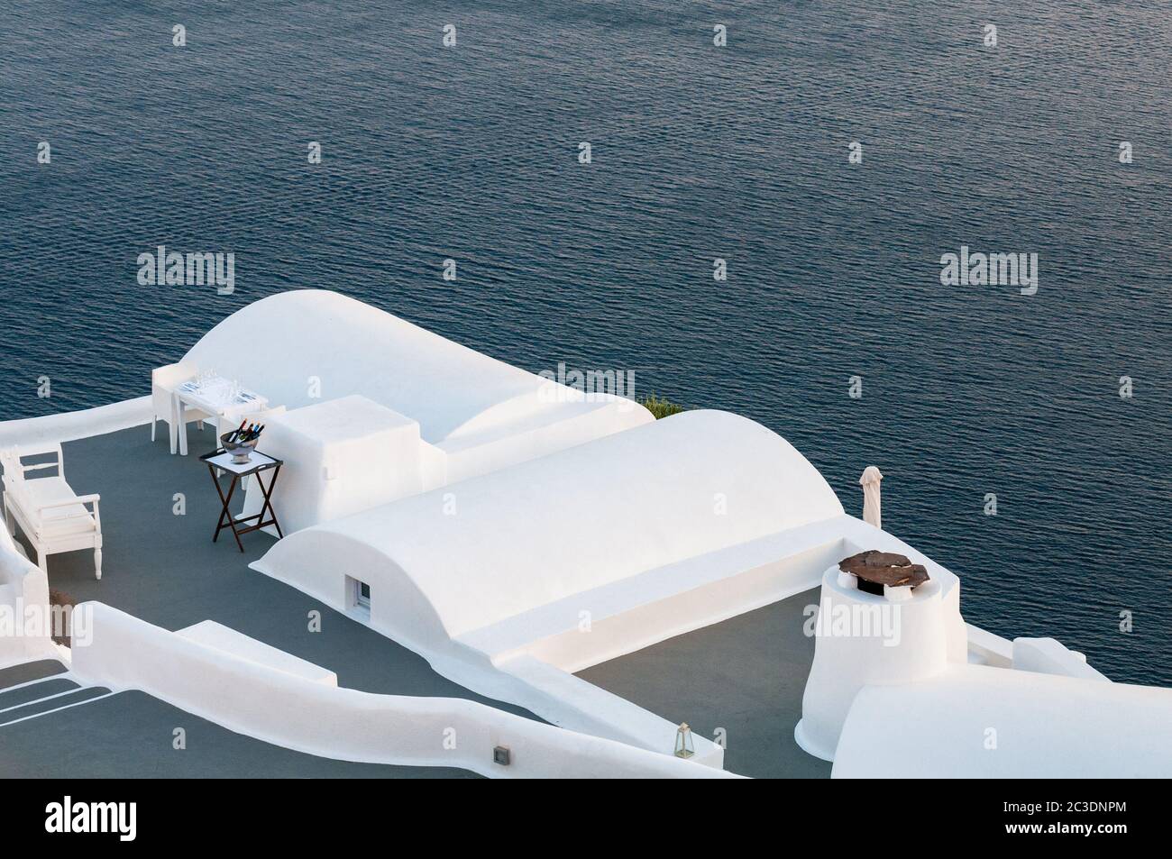 Santorini traditional charming white architecture, and blue sea ...