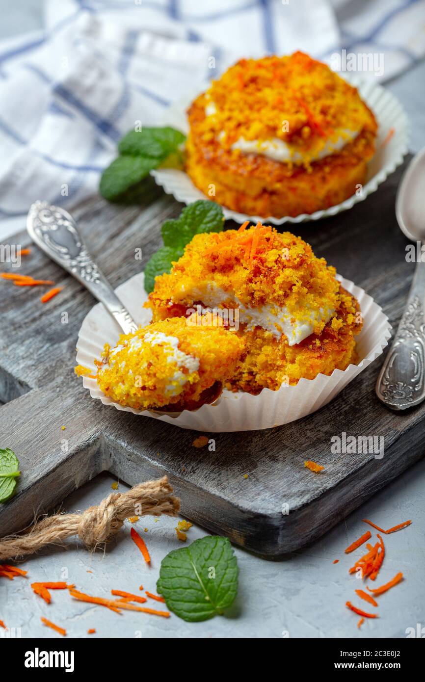 Individual carrot cake with cottage cheese cream. Stock Photo
