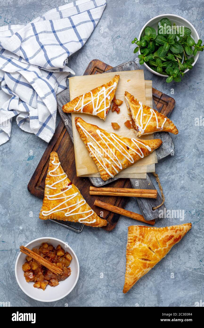 Apple turnovers with cottage cheese cream. Stock Photo