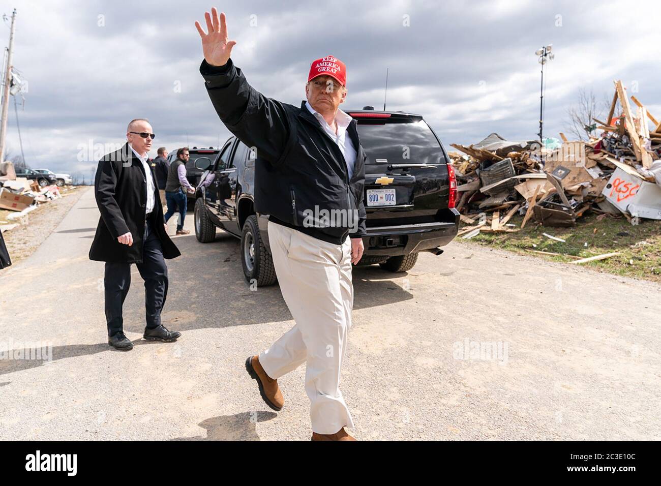 President Donald J. Trump bids farewell to residents as he departs the tornado ravaged neighborhood near Cookeville, Tenn., Friday, March 6, 2020, where a tornado struck early on Tuesday March 3rd killing 18 of the 24 people killed in central Tennessee. Stock Photo