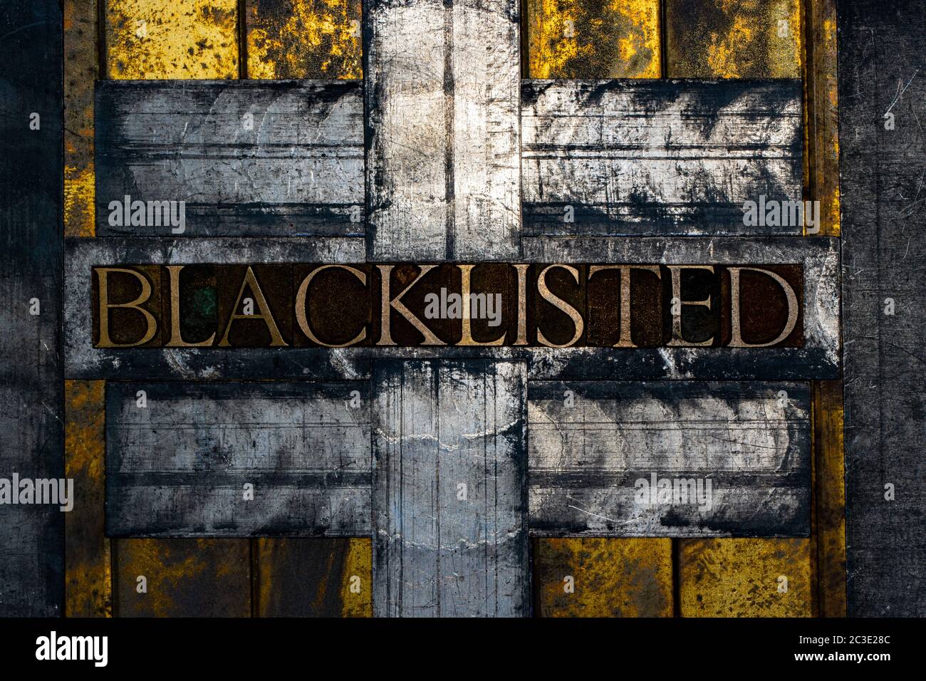 Blacklisted text formed with real authentic typeset letters on vintage