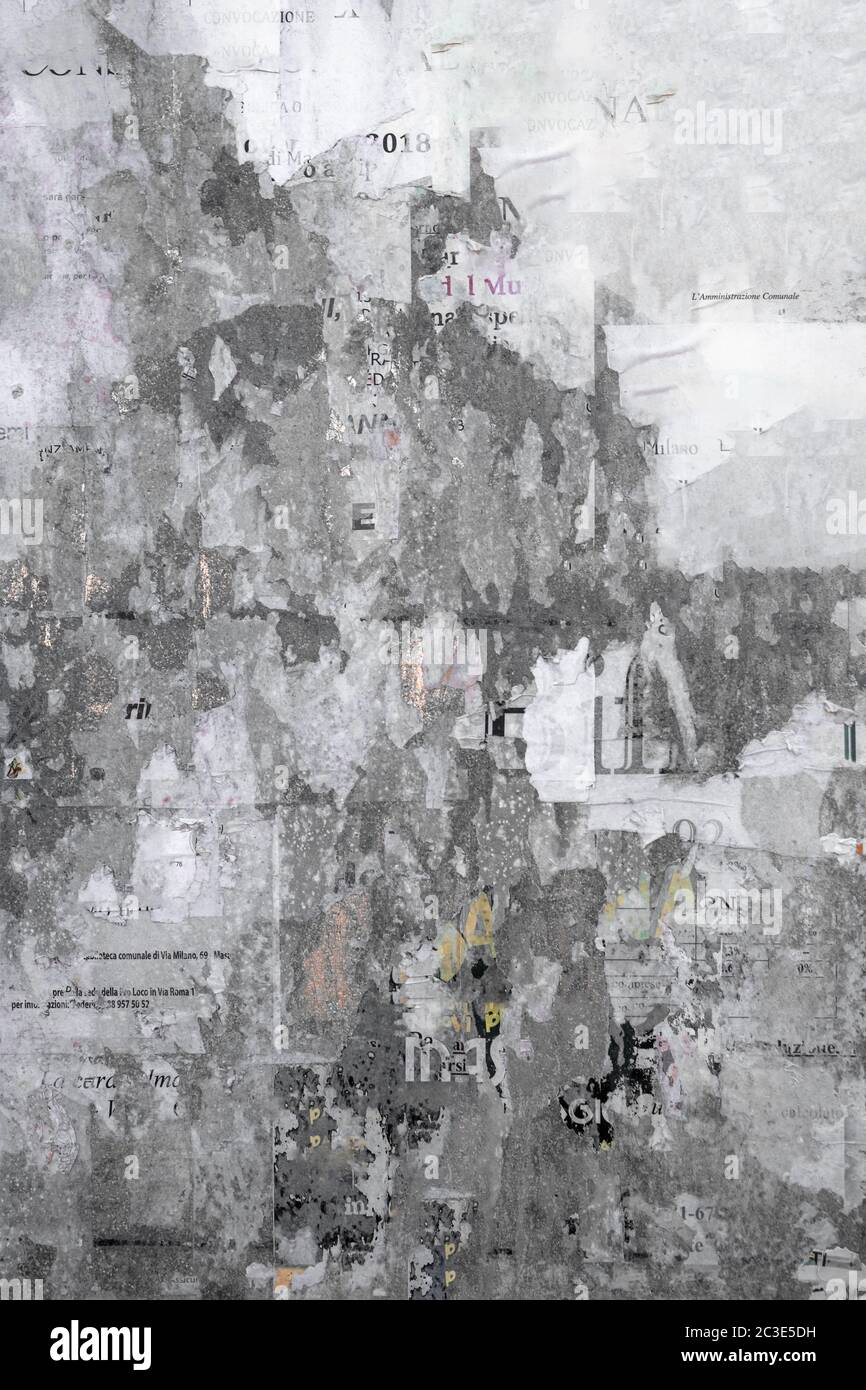 Grunge Background with Old Torn Posters Stock Photo