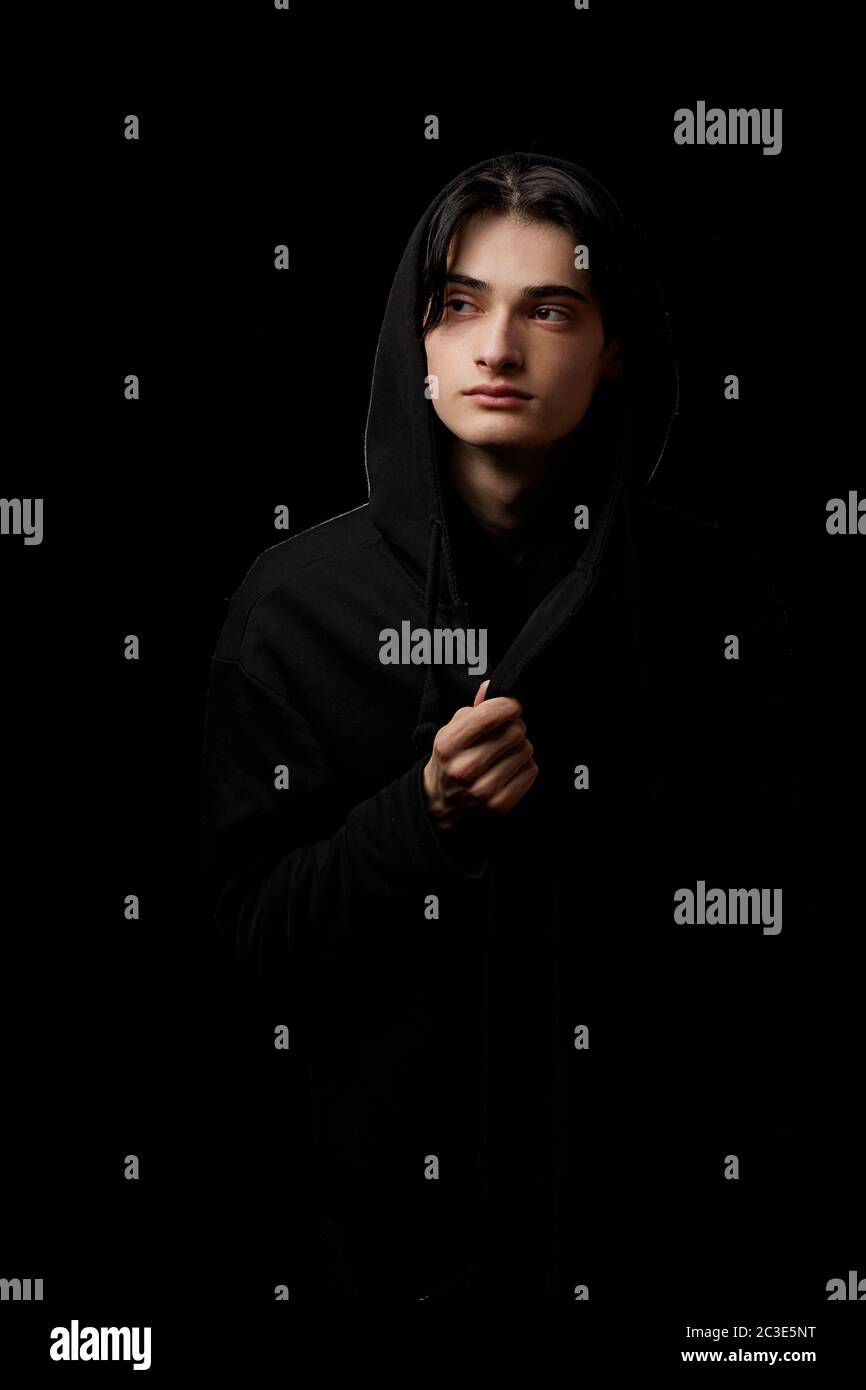 Man in black clothes hi-res stock photography and images - Alamy