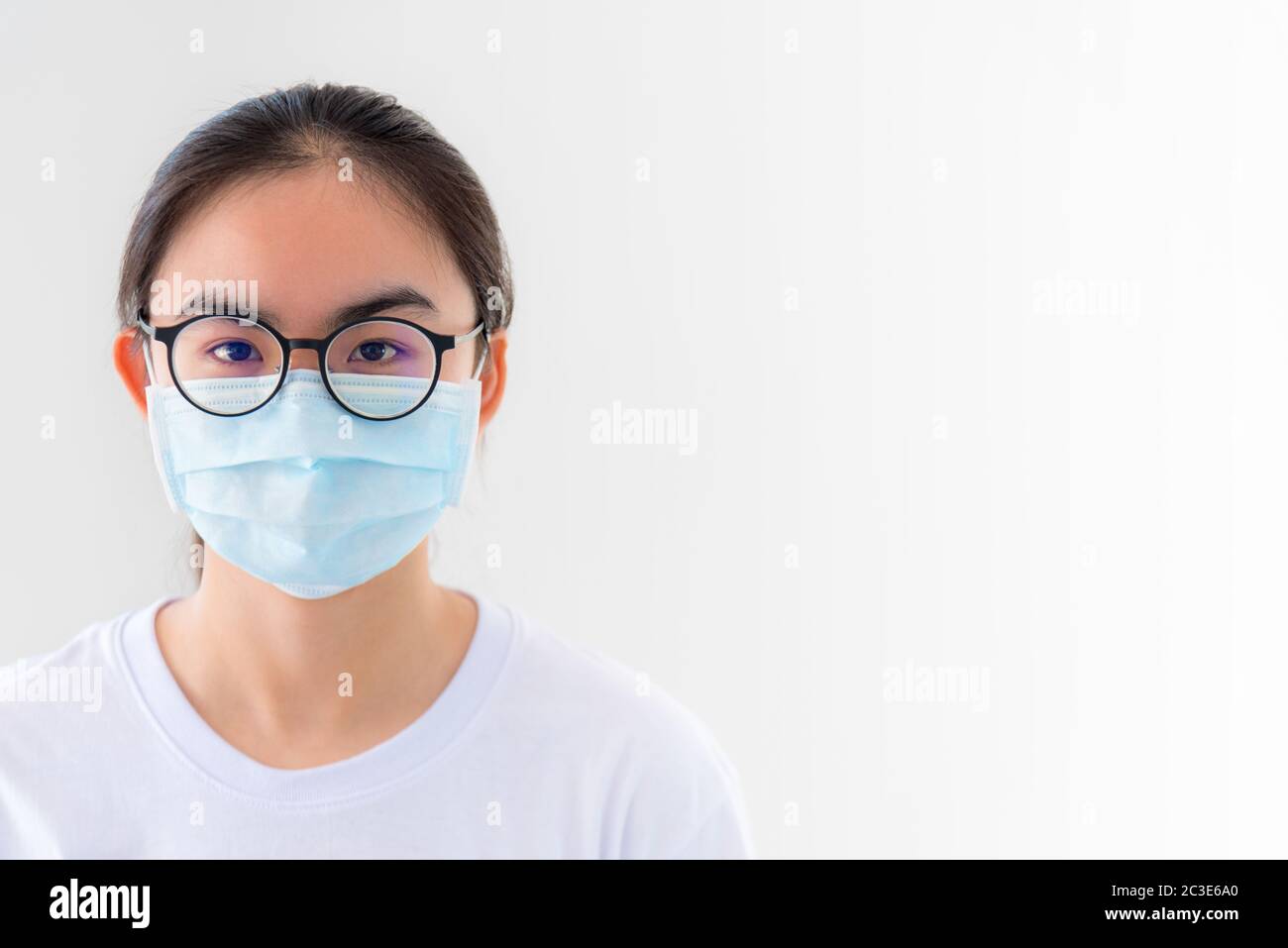 Closeup face woman wearing mask anti virus Stock Photo