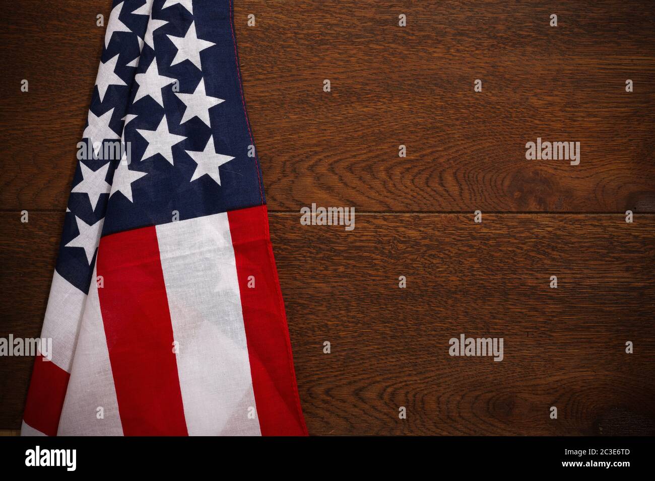 Retro american flyer, 4th of july background. Pride day flag. USA flag on wooden table Stock Photo