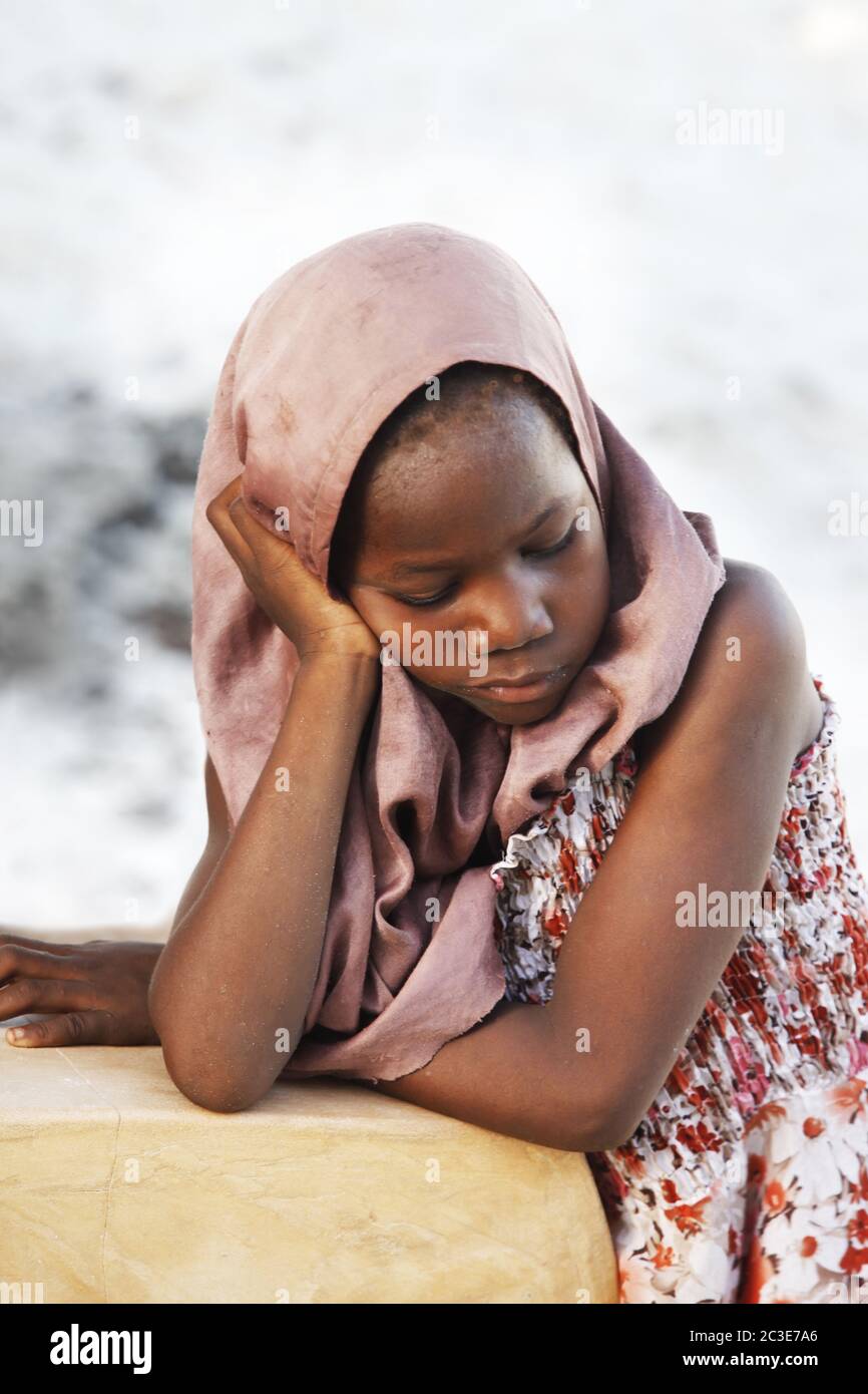 Sad girl sitting beach hi-res stock photography and images - Alamy