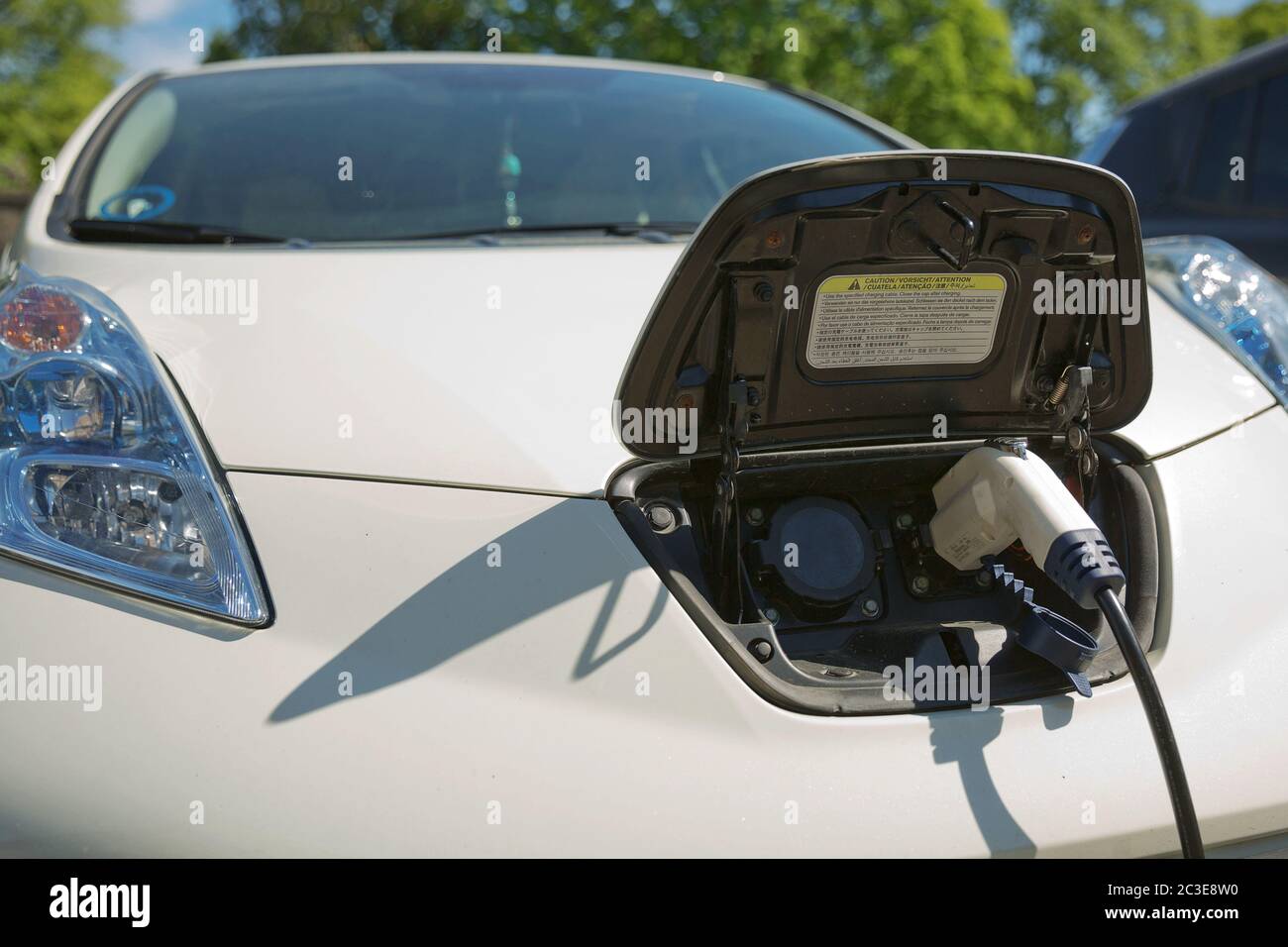 Charging an electric car in public station by the street in Oslo Norway