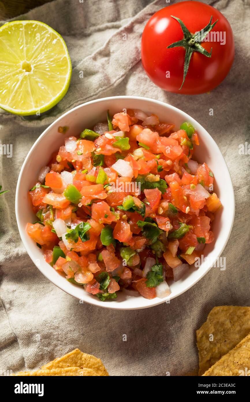 Spicy Homemade Pico De Gallo with Cilantro and Chips Stock Photo Alamy