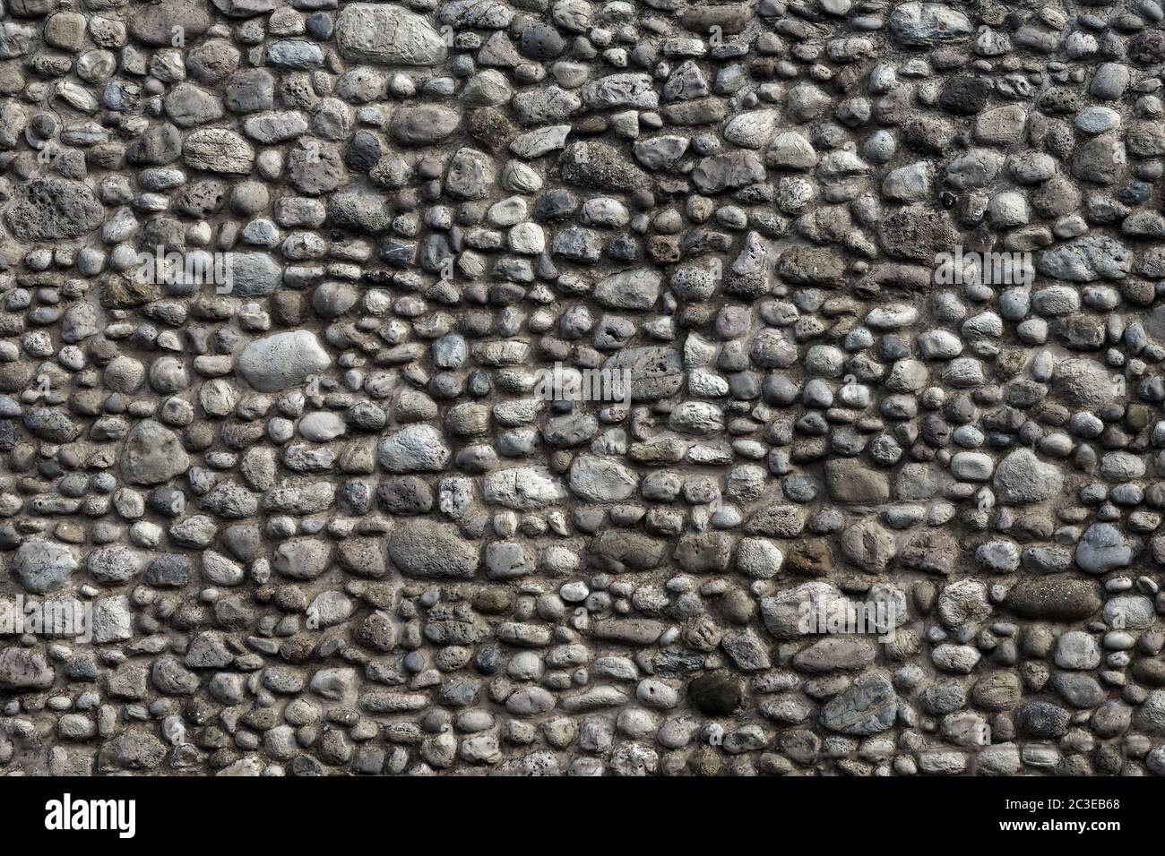 Natural stone wall background Stock Photo