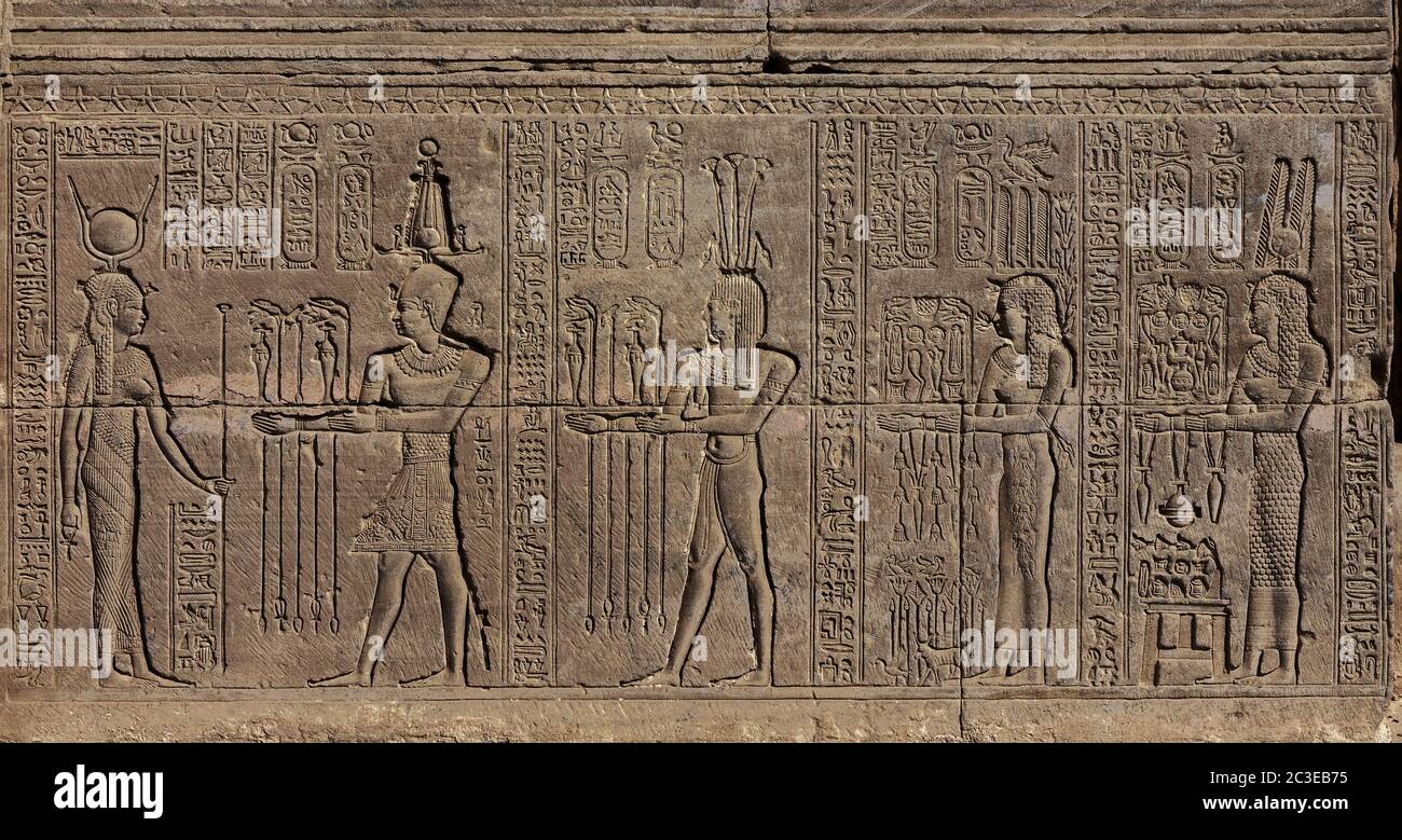 Hieroglyphic egypt carvings on wall Stock Photo - Alamy