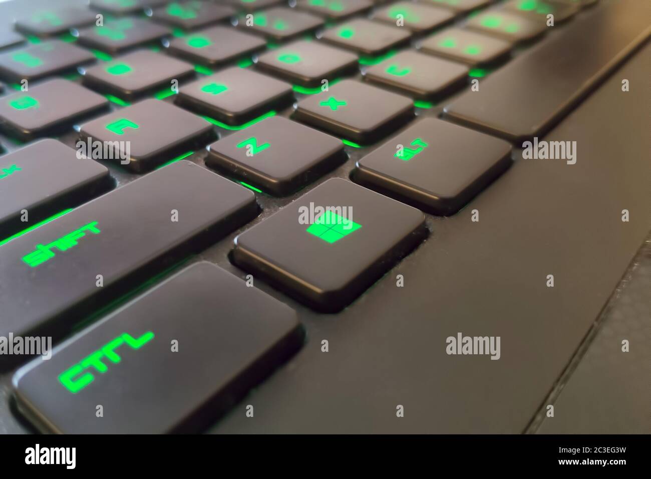 Moscow, Russia - June 04, 2019: green Windows button on a keyboard with lighting. Close up of shift, ctrl, alt Stock Photo