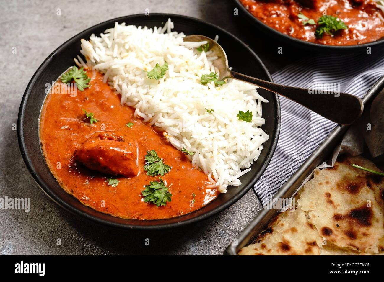 Creamy Butter Chicken/Murgh Makhani served with Roti and Basmati rice