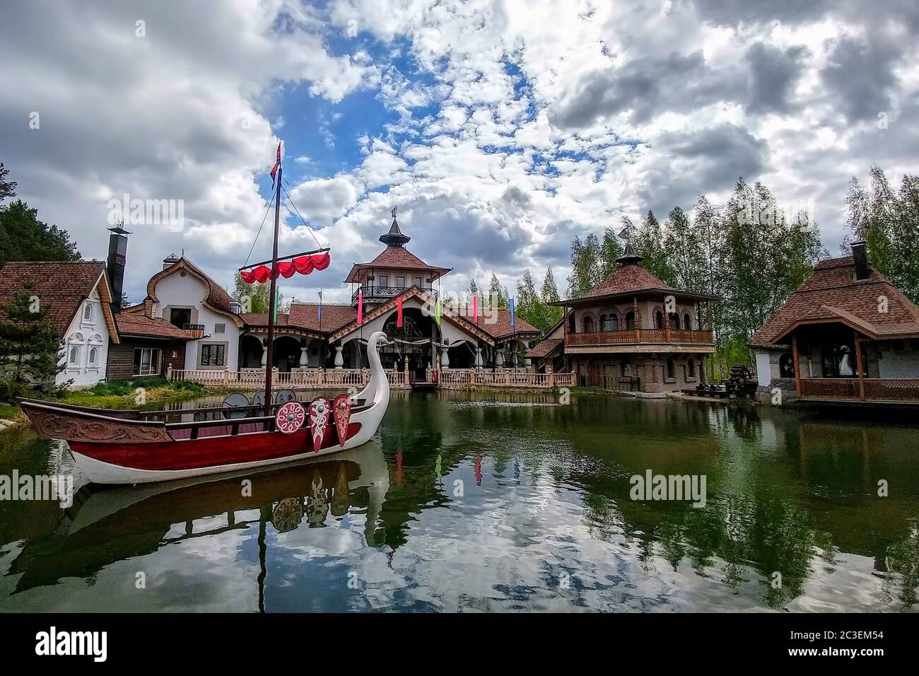 Ryazan, Russia - April 14, 2019: Main exterior of Ethnic hotel 'Как v staroy skazke' in Russian style. Hotel 'Like an old fairy tale.' Made in the ethnic Russian style and located in the forest. Stock Photo