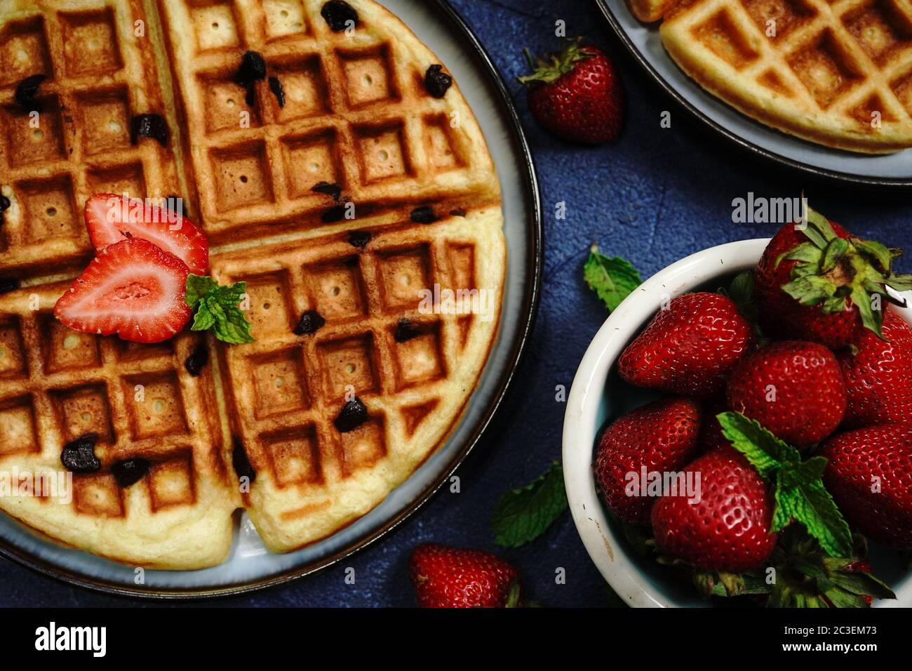 Homemade Chocolate chip waffles with strawberries Stock Photo Alamy