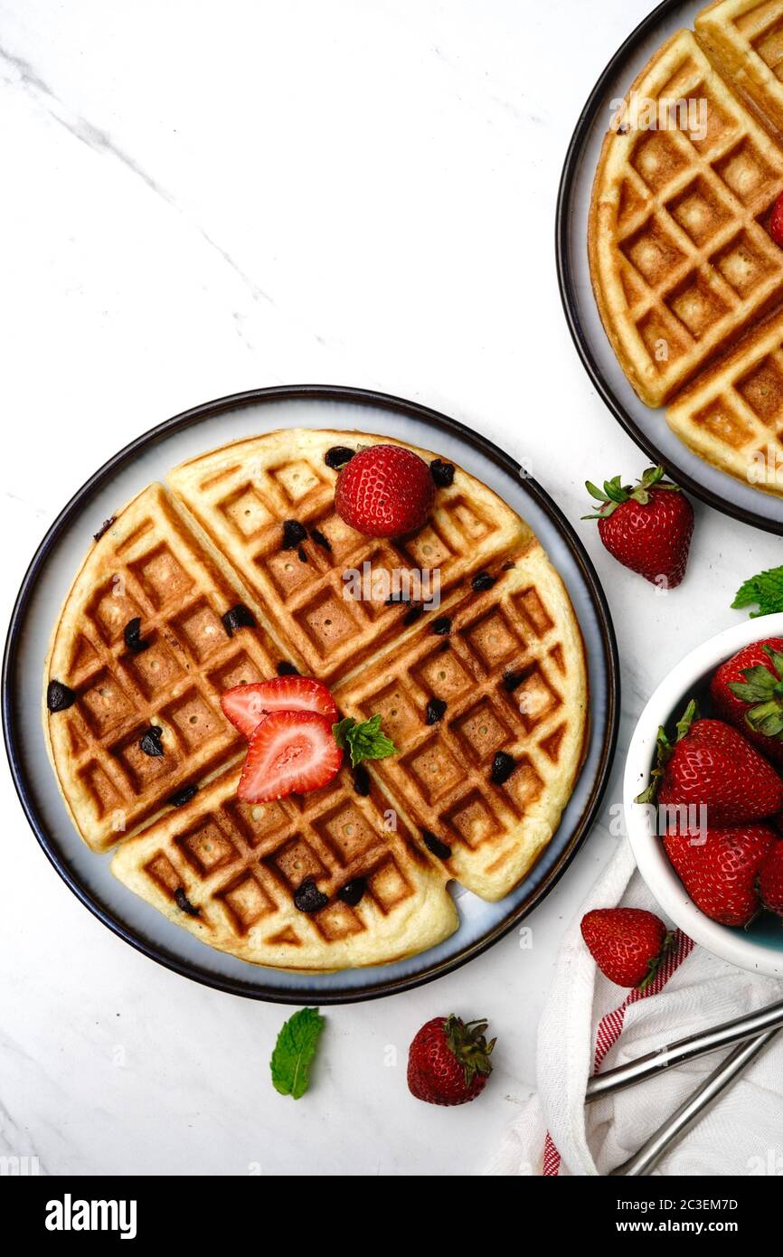Homemade Chocolate chip waffles with strawberries Stock Photo Alamy