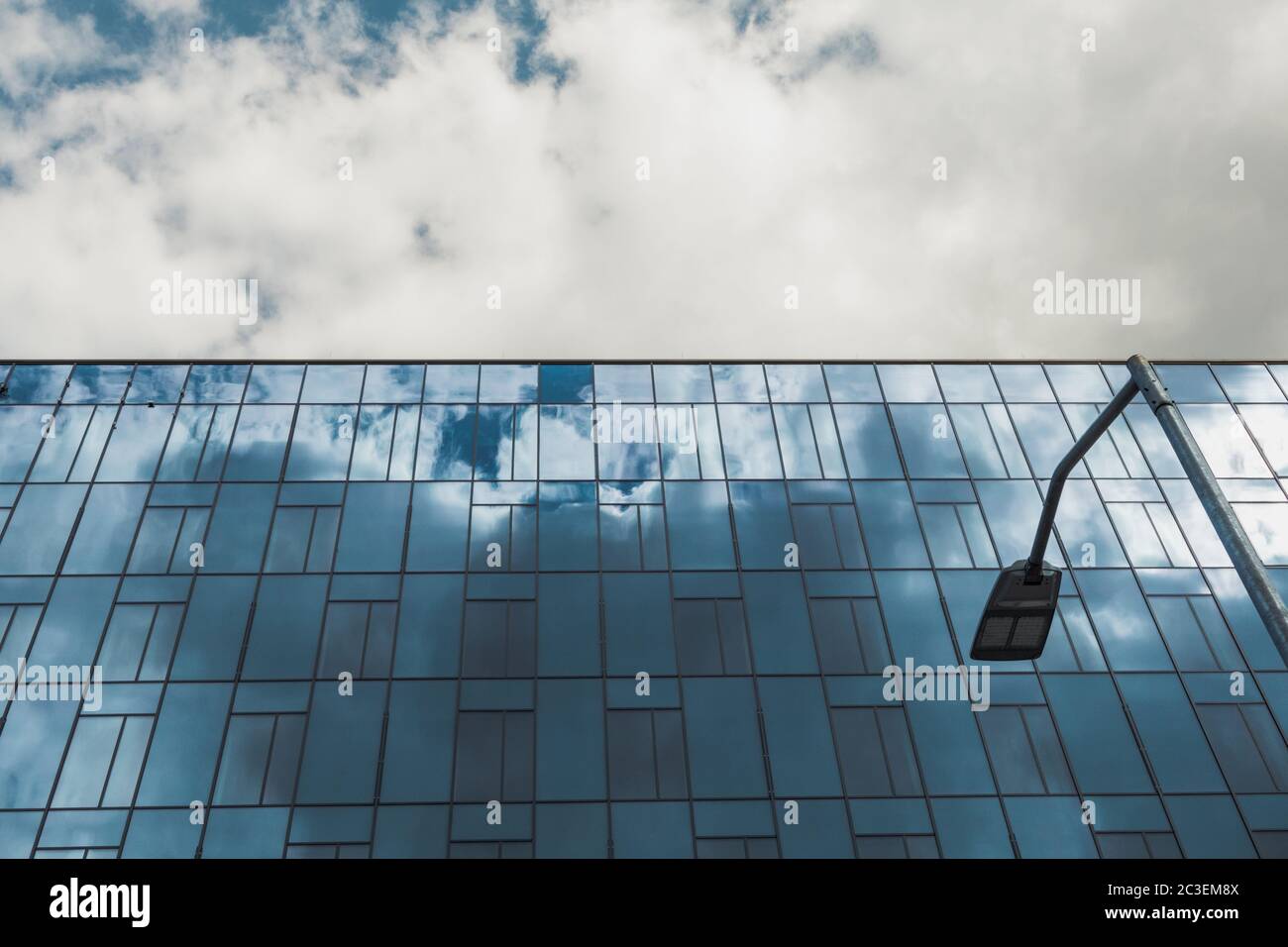 modern corporate building with clouds reflecting in the glass Stock ...
