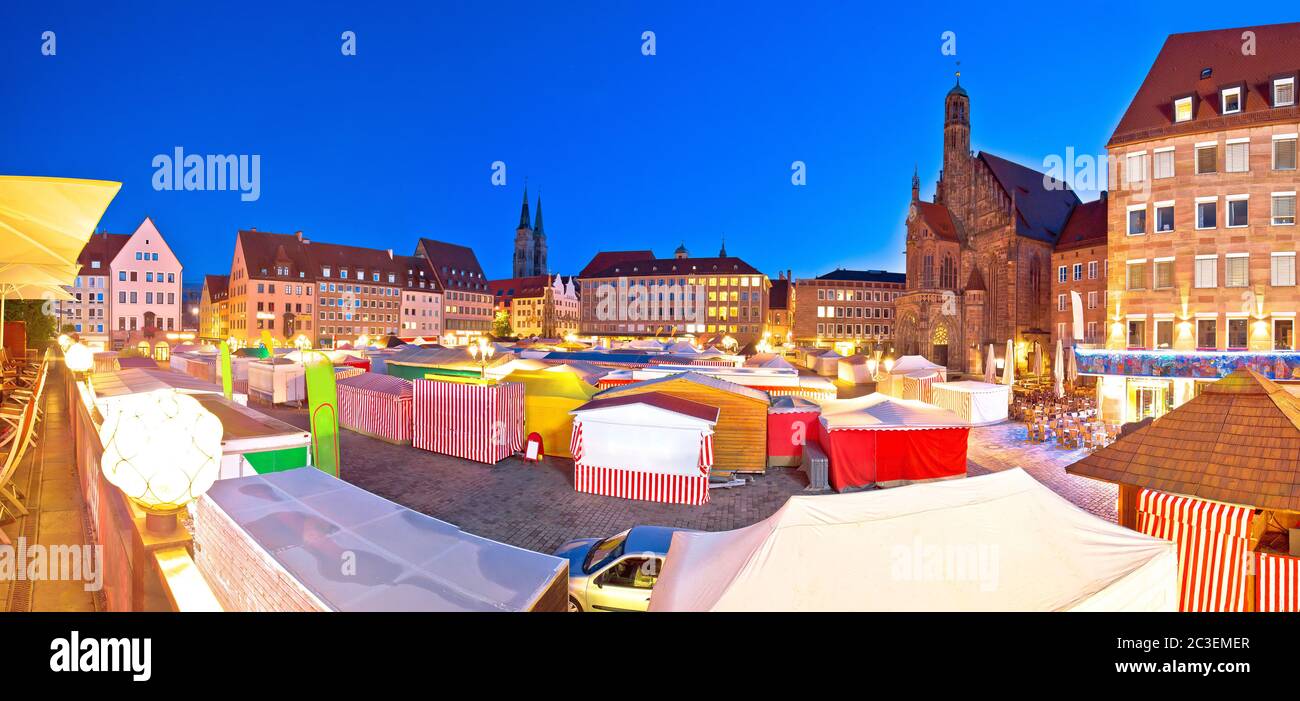 Nurnberg. Nuremberg main square and church of Our Lady or Frauenkirche dusk panoramic view Stock Photo