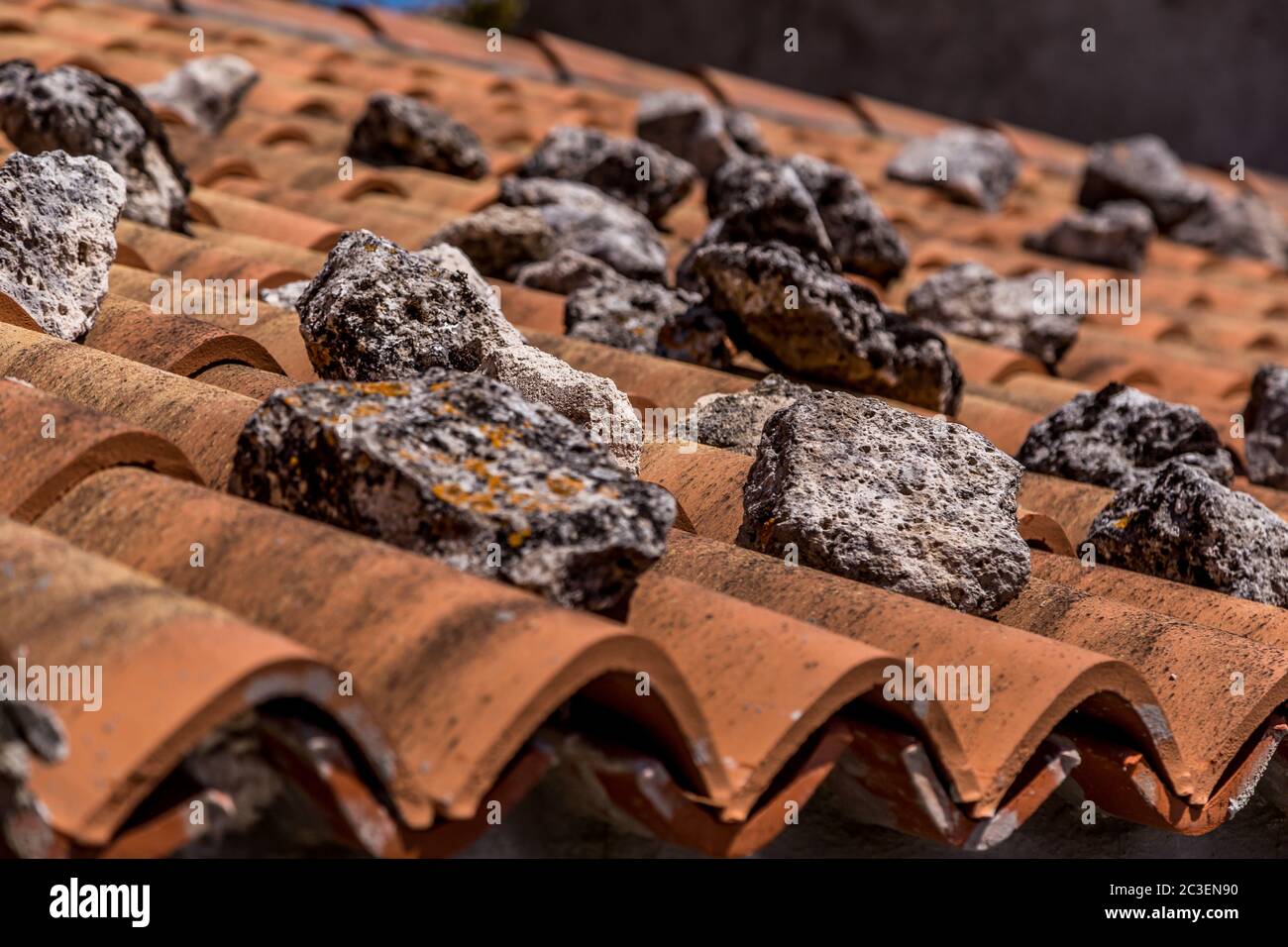 roof tiles with stones Stock Photo