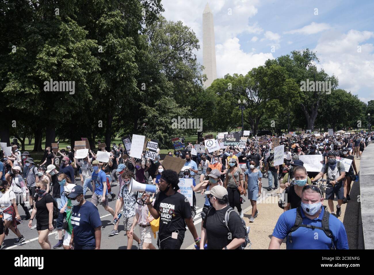 Washington, USA. 19th June, 2020. Protesters from Freedom Day MarchÕs movement march from The National Museum of African American History & Culture to Martin Luther King memorial and pay honor during a rally about Juneteenth 2020 today on June 19, 2020 in Washington DC, USA. (Photo by Lenin Nolly/Sipa USA) Credit: Sipa USA/Alamy Live News Stock Photo