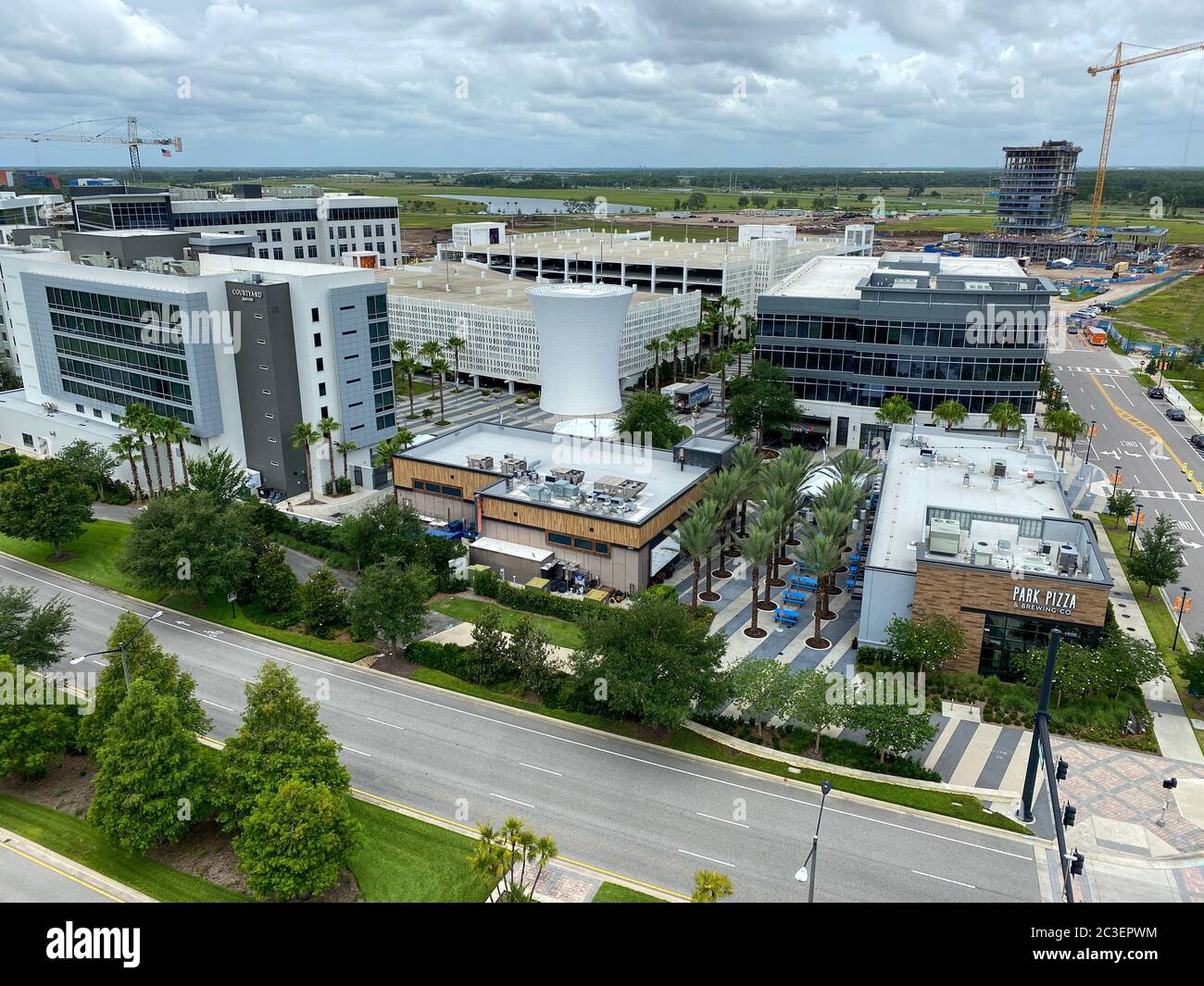 Orlando, FL/USA-6/3/20:  An aerial photo of Lake Nona's Town Center with a Marriott Courtyard hotel and restaurants in Orlando, Florida. Stock Photo