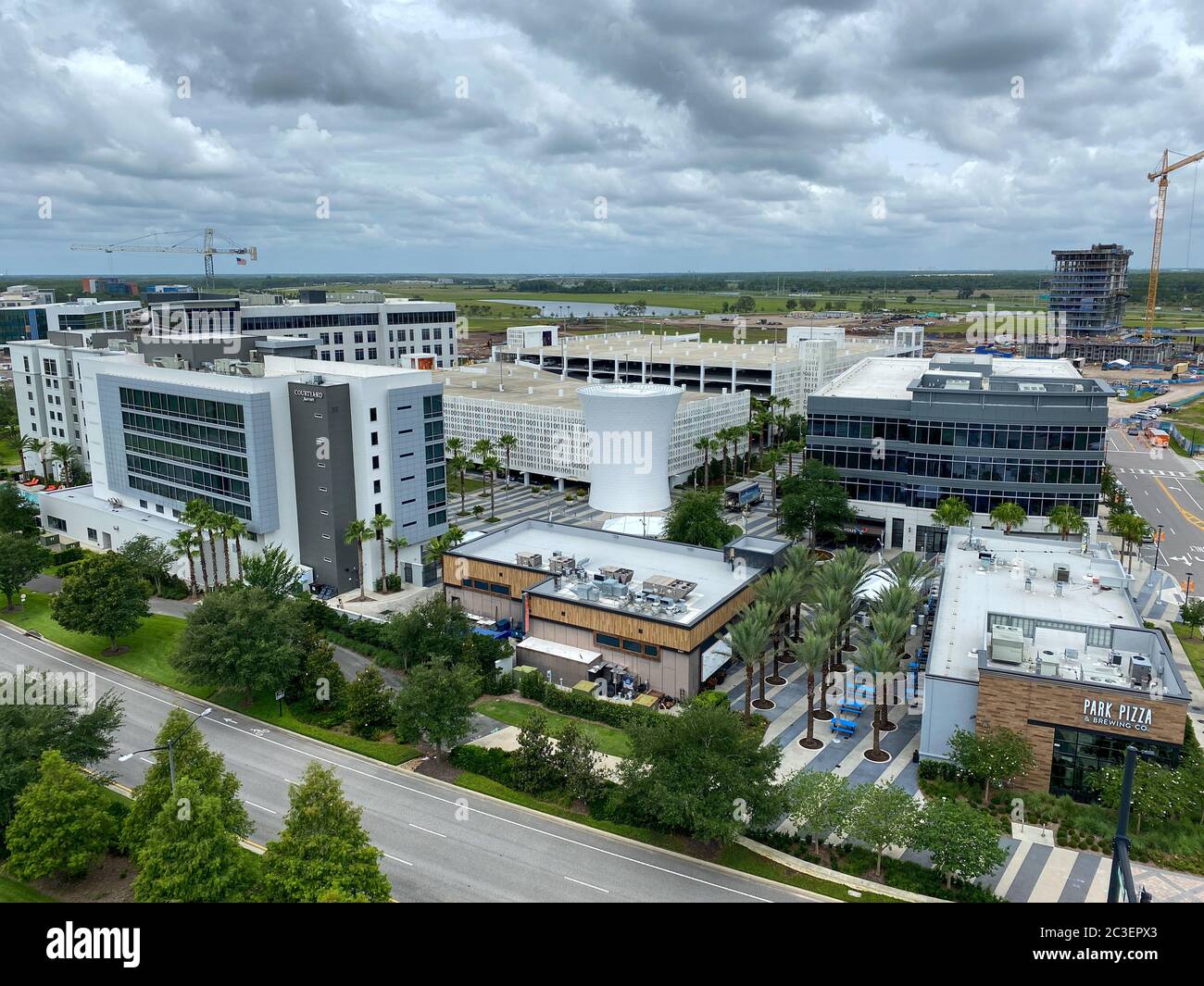 Orlando, FL/USA-6/3/20:  An aerial photo of Lake Nona's Town Center with a Marriott Courtyard hotel and restaurants in Orlando, Florida. Stock Photo