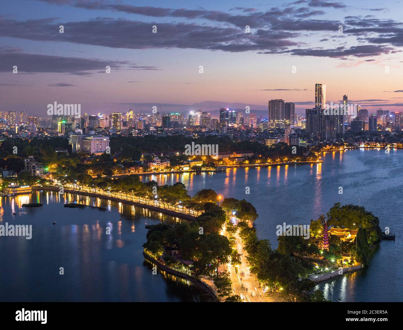 Aerial view of Hanoi skyline showing West Lake and Tay Ho District at dusk in Hanoi, Vietnam. Stock Photo