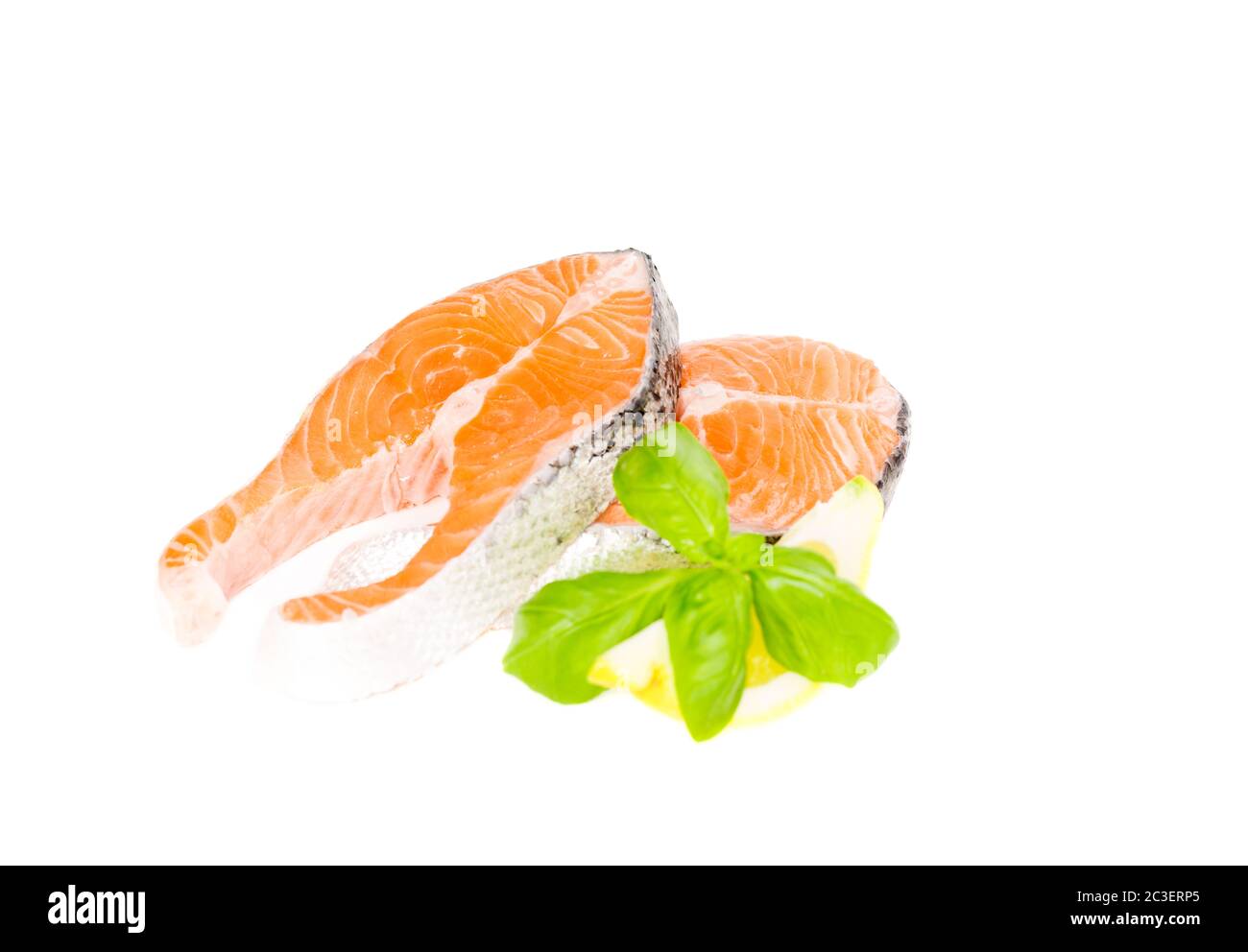 Salmon with basil and lemon isolated, copy space Stock Photo