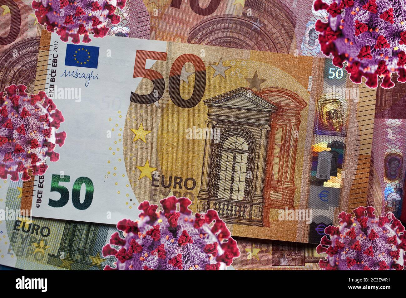 How does the corona crisis affect the economy, 50 euro note with corona viruses, photo Assembly Stock Photo