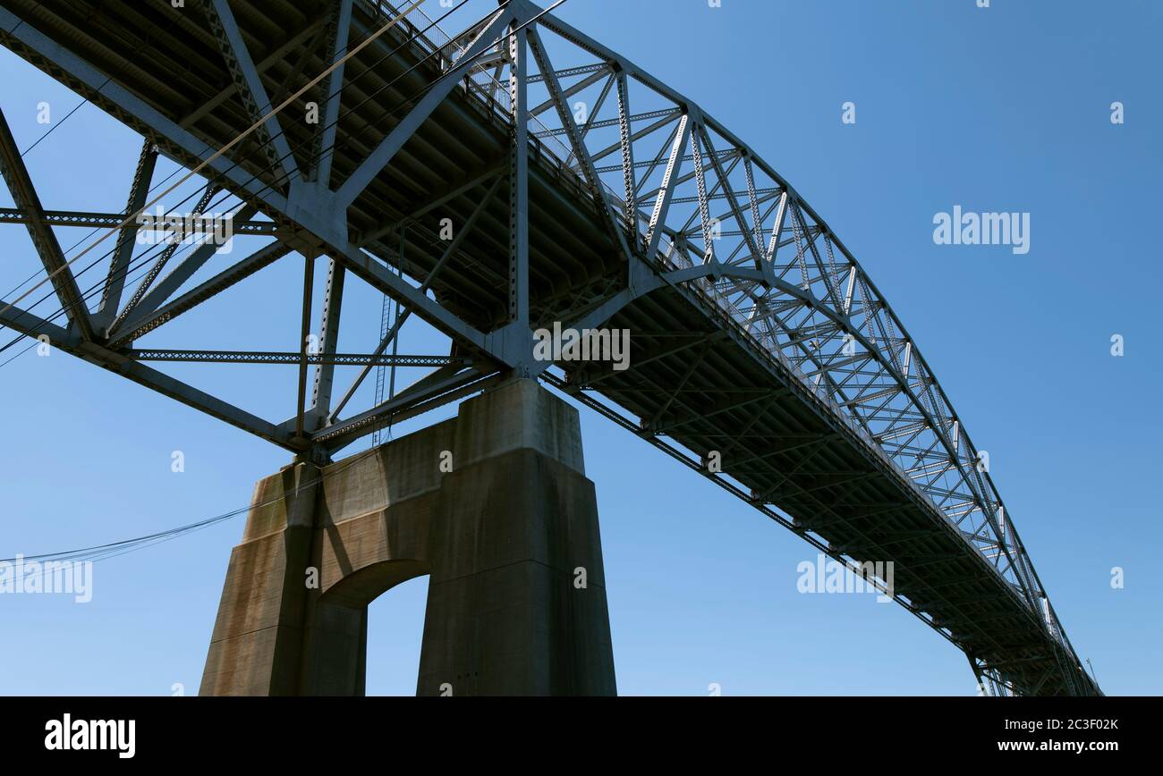 The Bourne Bridge (1935) which spans the Cape Cod Canal.  Slated for replacement. Bourne, Massachusetts, USA Stock Photo