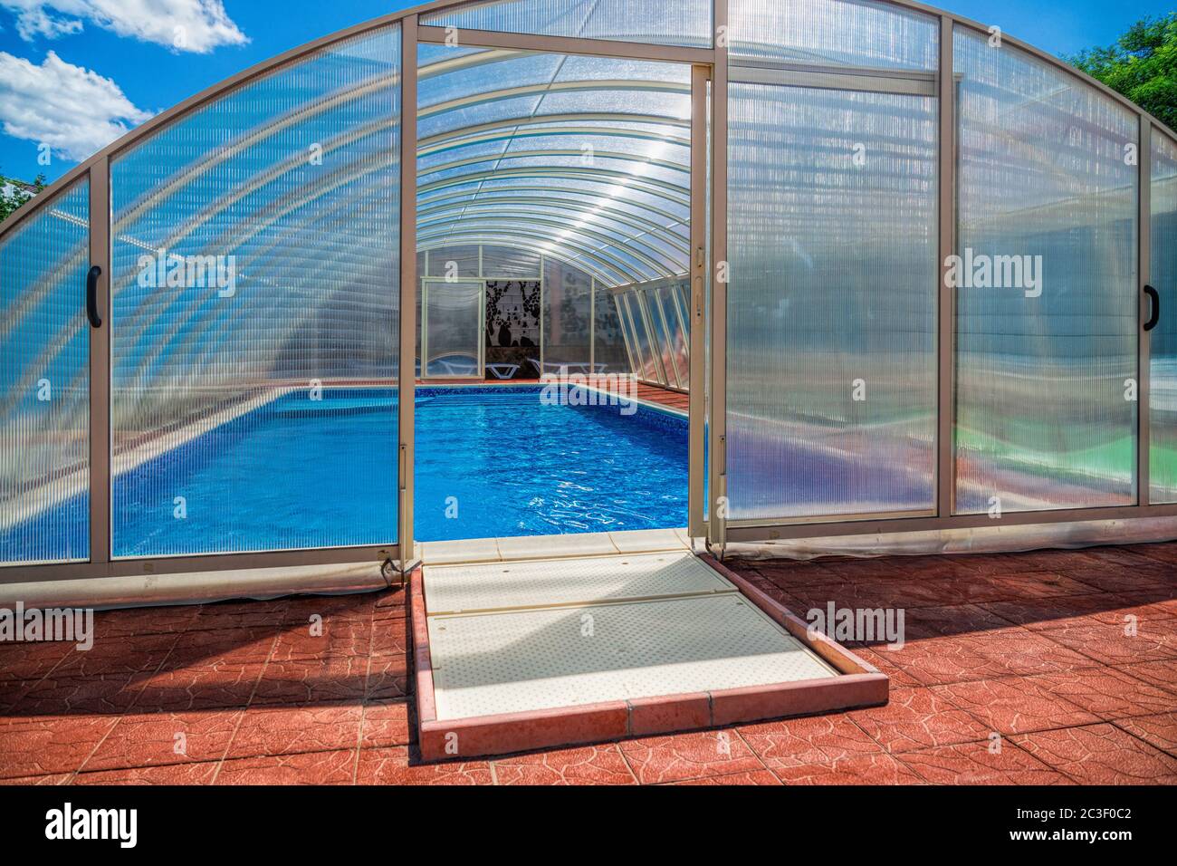 The covered area of the outdoor pool for hotel. Water retains heat