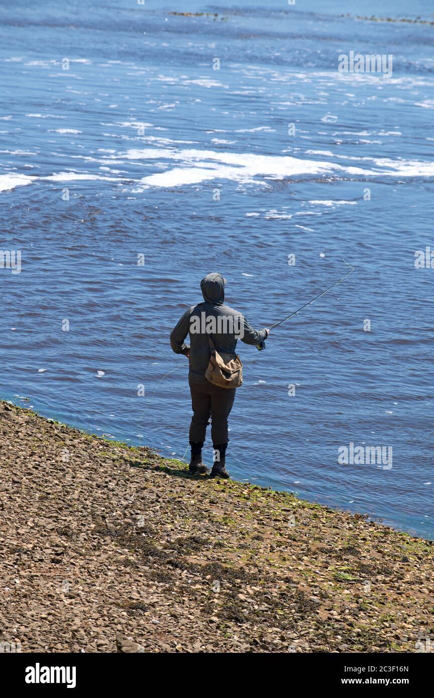 A fly fisherman in Wellfleet, Massachusetts on Cape Cod, USA Stock Photo