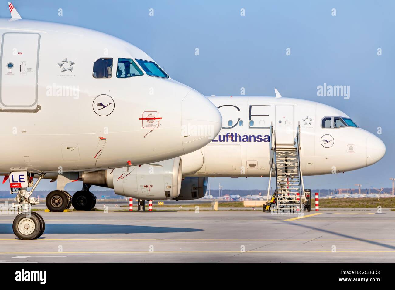 Airplanes of the German Lufthansa are going to to parking on the runways at Frankfurt Airport Stock Photo