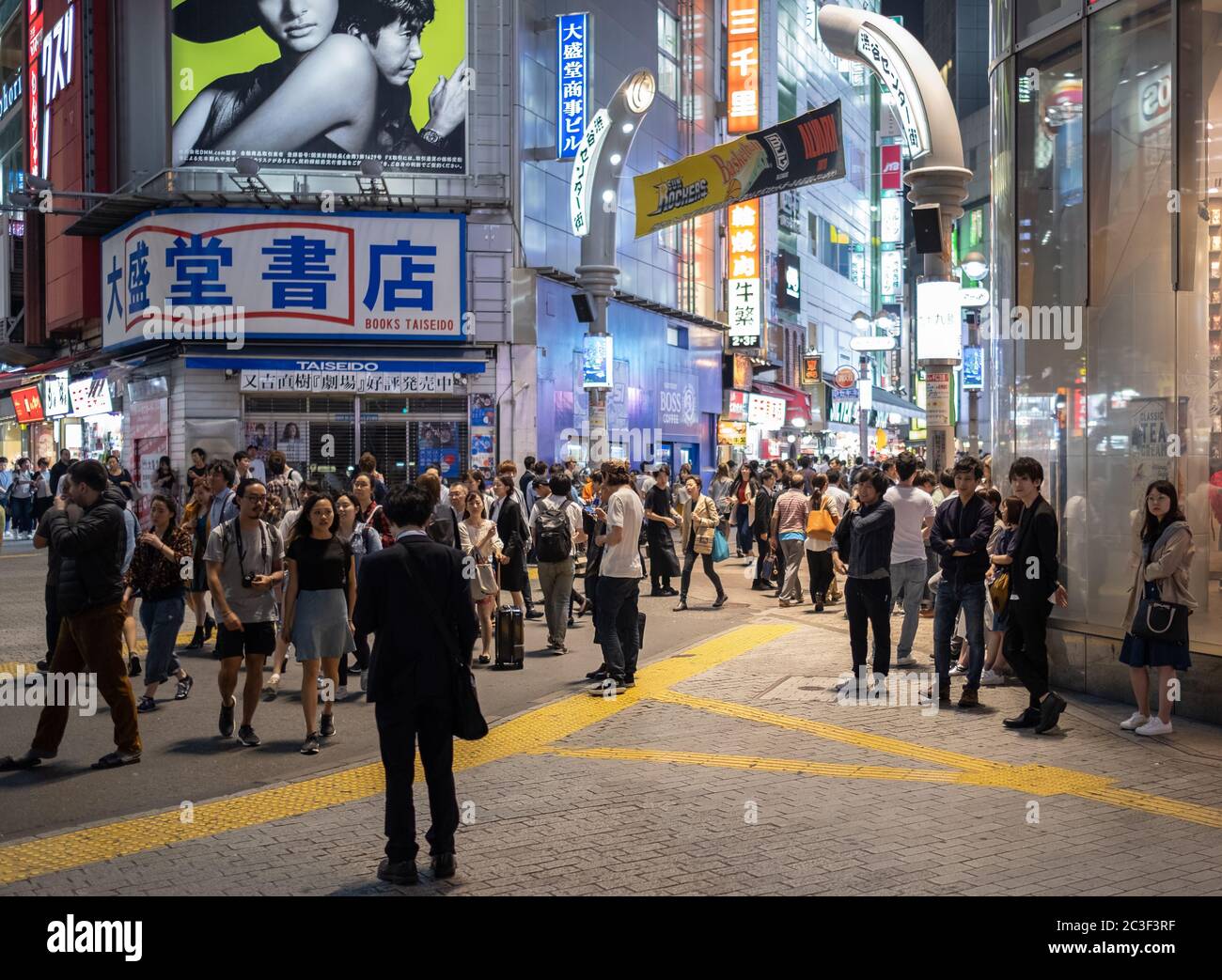 Pedestrian walking in Shibuya street a night, Tokyo, Japan. Stock Photo