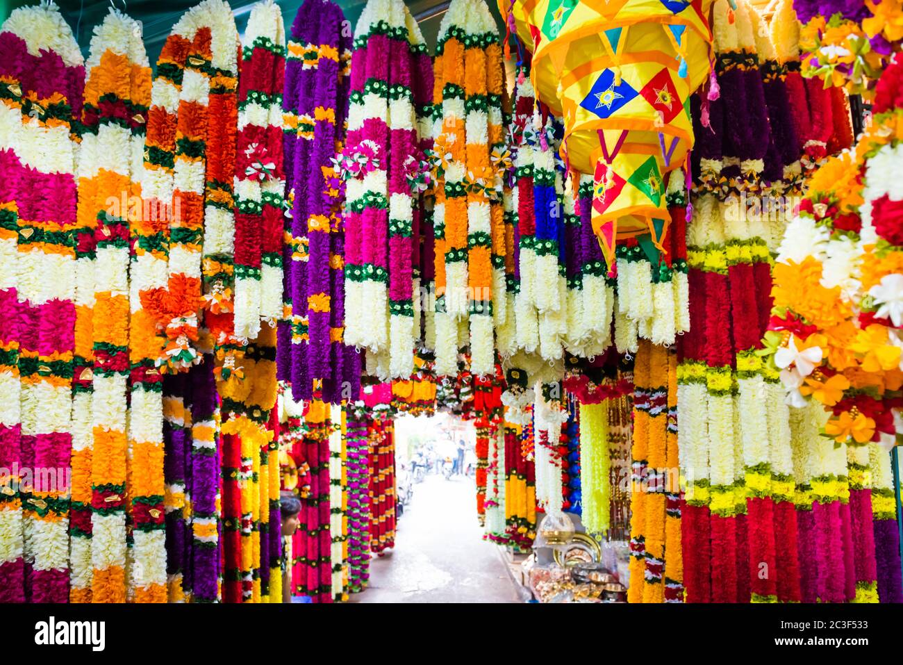 Indian garlands of colorful flowers for temple Stock Photo