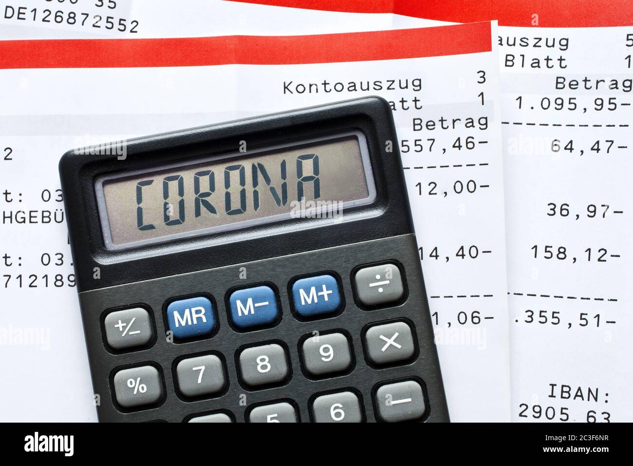 Calculator with the font Corona and account statements, Corona crisis on the economy, Germany Stock Photo