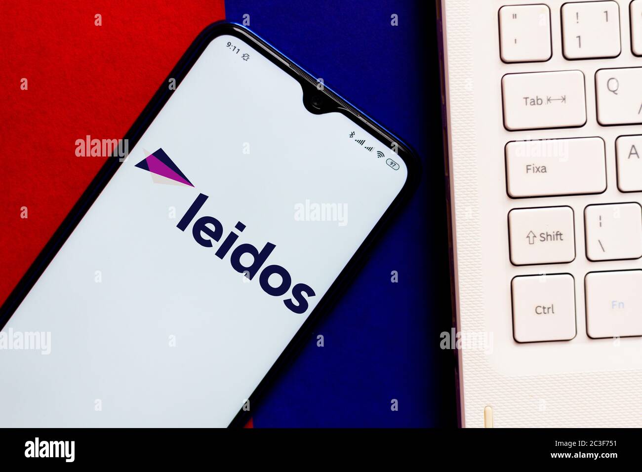 In this photo illustration the Leidos Holdings logo seen displayed on a