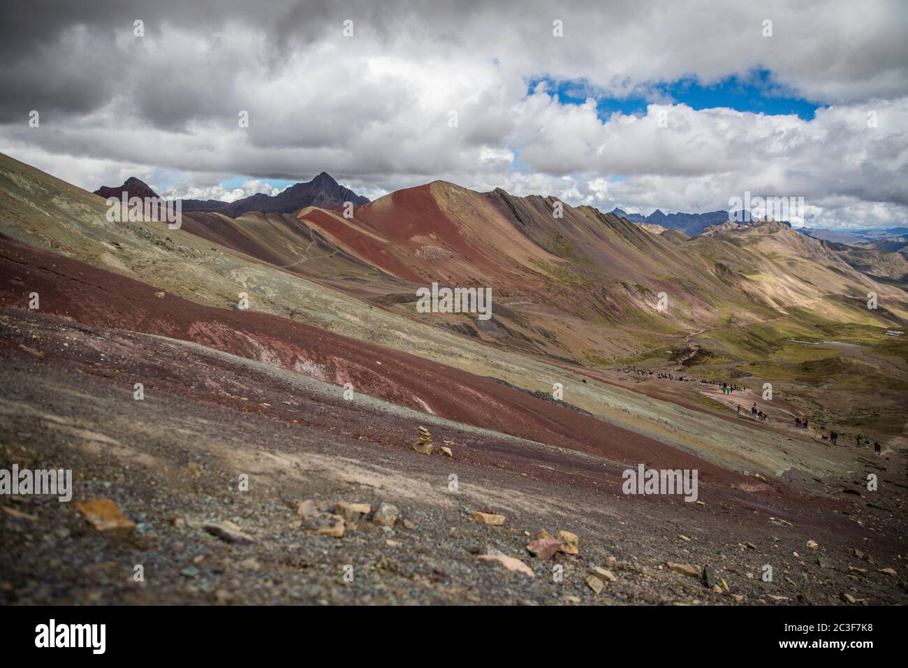 mountain of seven colors, grass, clouds and blue sky Stock Photo