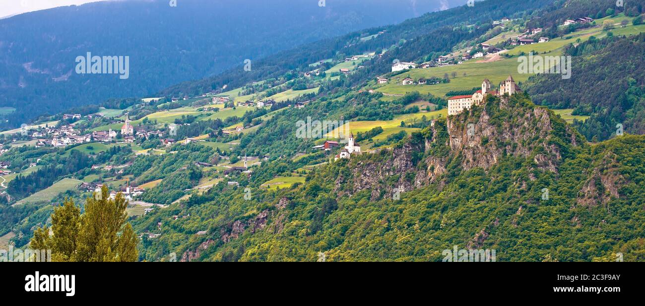 Kloster Saben castle on green Apls hills near Sabiona panoramic view Stock Photo