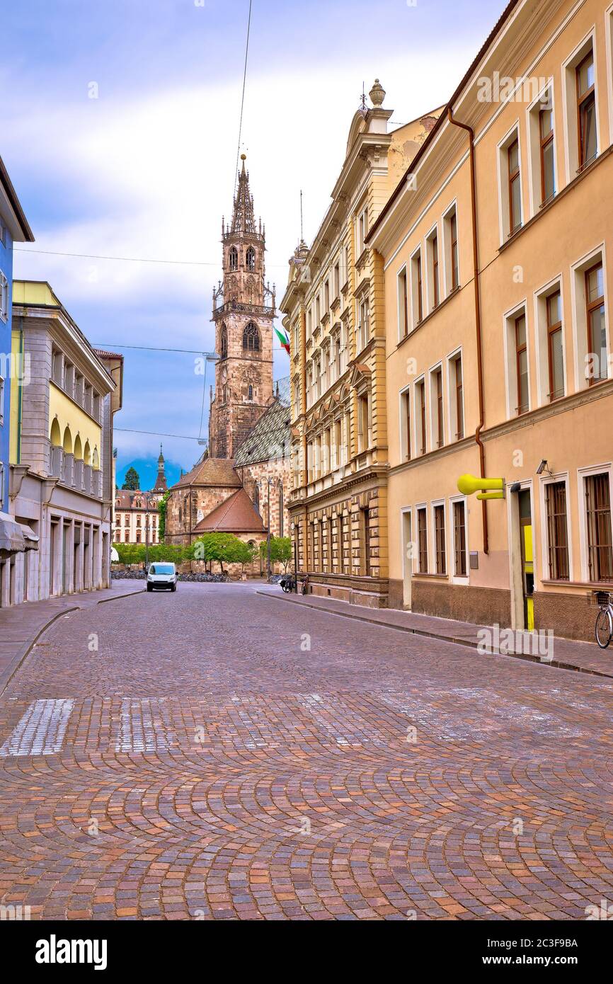 City of Bolzano empty old street and church view Stock Photo
