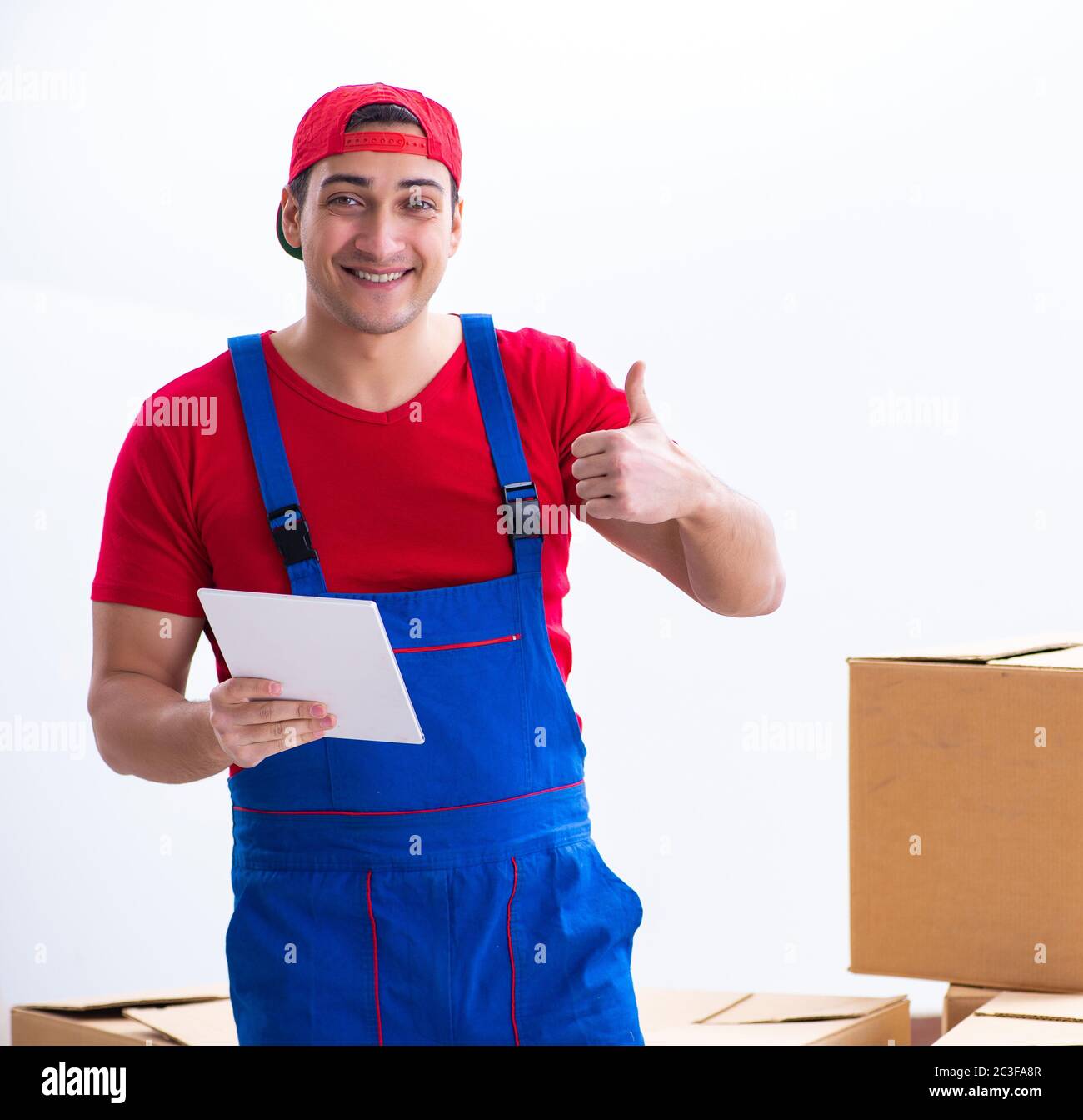 Contractor worker moving boxes during office move Stock Photo