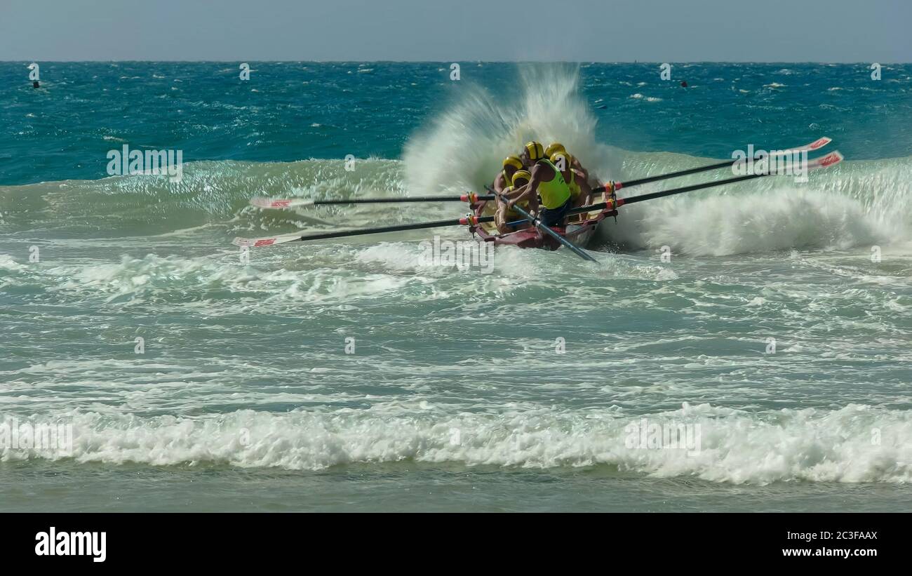 ALEXANDRA HEADLAND, QUEENSLAND, AUSTRALIA- APRIL 24, 2016: a surf boat crew at the start of a race Stock Photo