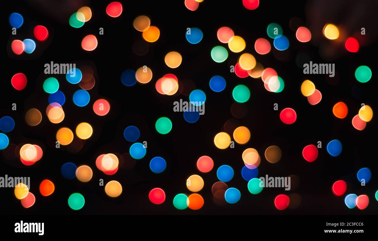 multicolored circles on a black background abstract pattern Stock Photo
