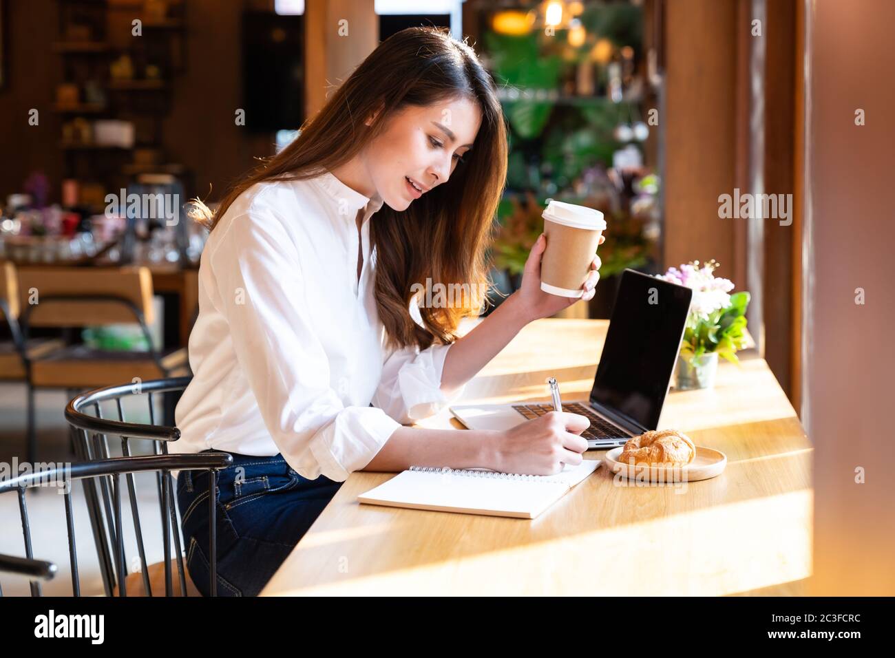 Asian Woman work from home Stock Photo