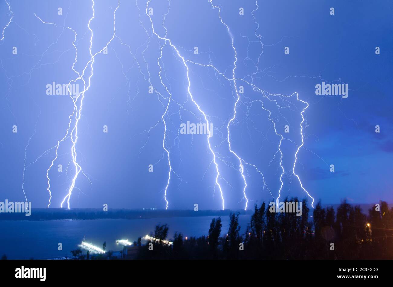 Bright night flash of lightning over the river Stock Photo Alamy