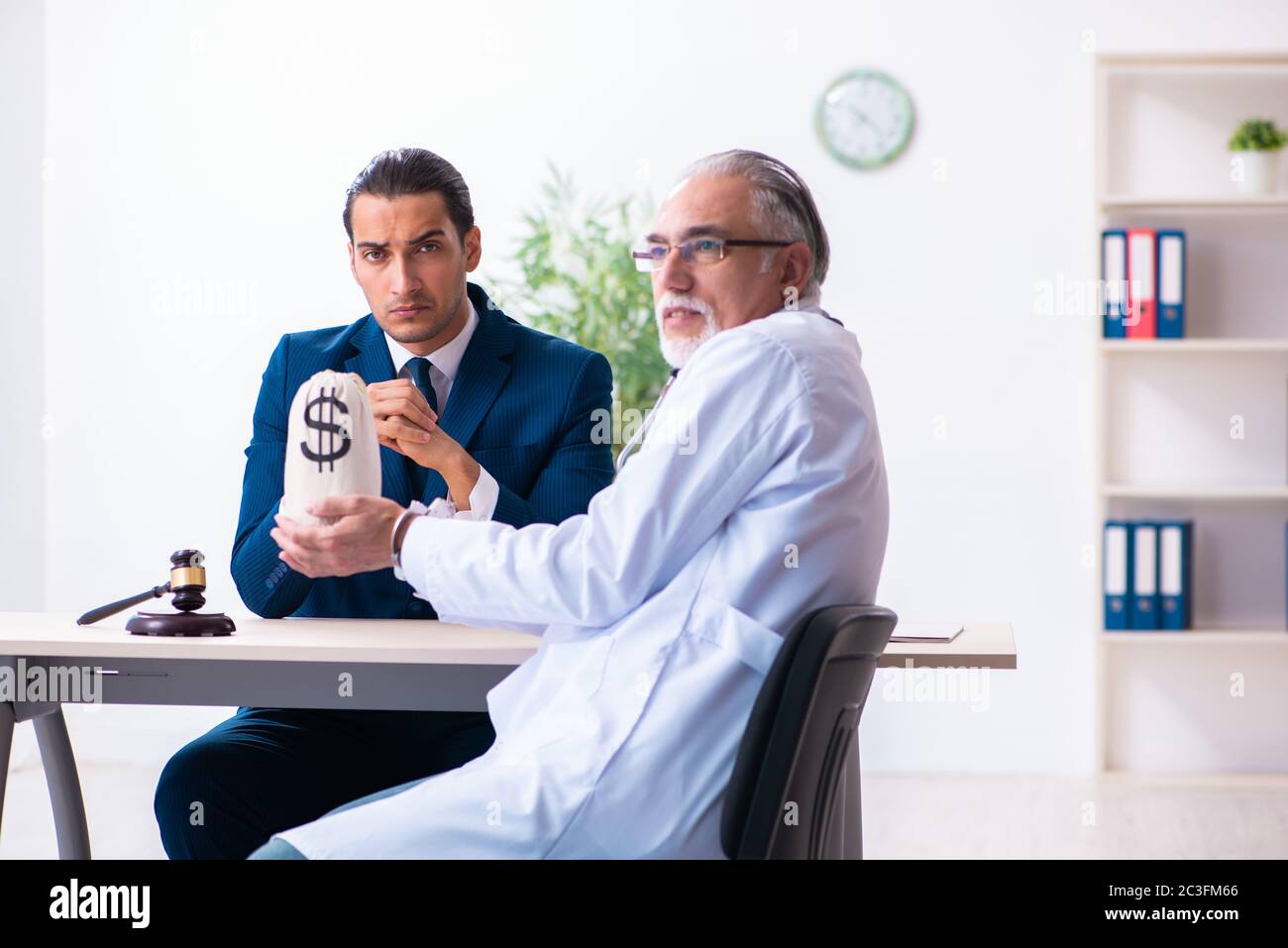 Male doctor in courthouse meeting with lawyer Stock Photo Alamy