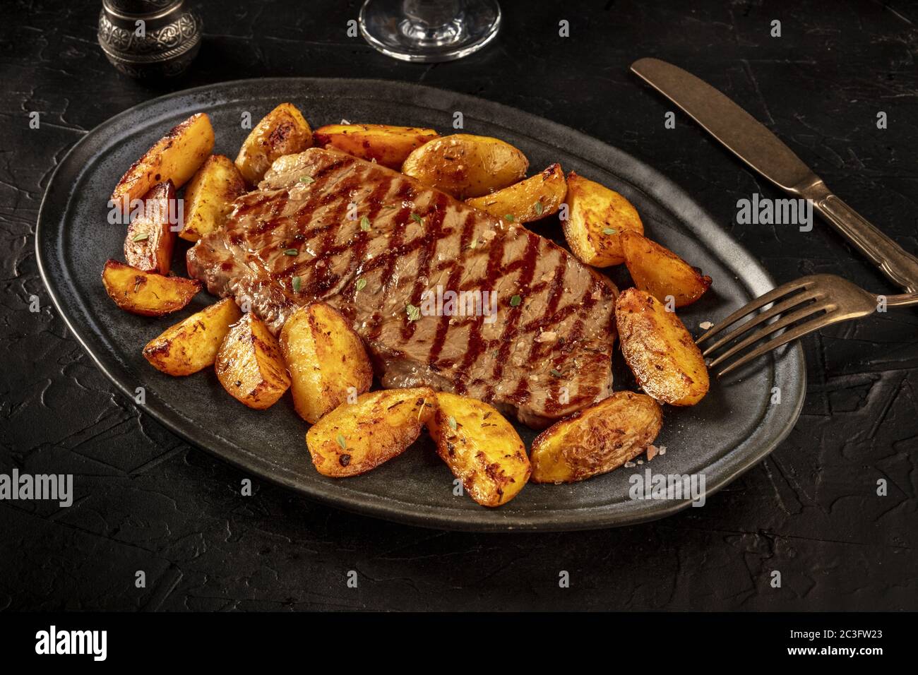 Ribeye steak baked potato hi-res stock photography and images - Alamy